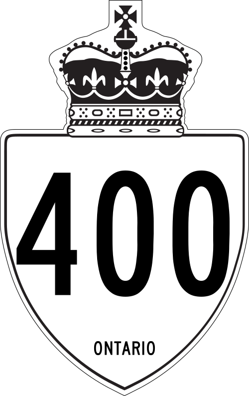 Panneau routier primaire/série 400 typique de l'Ontario utilisant un bouclier en forme de balle