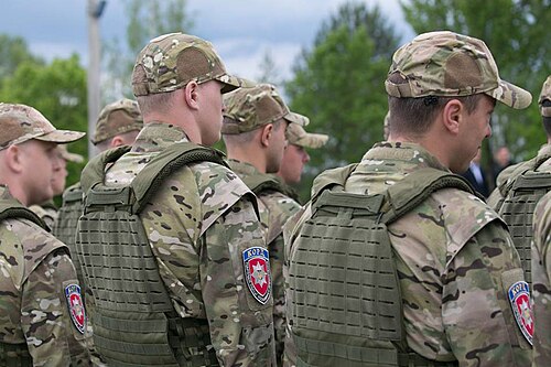 Les membres de KORD portent MultiCam