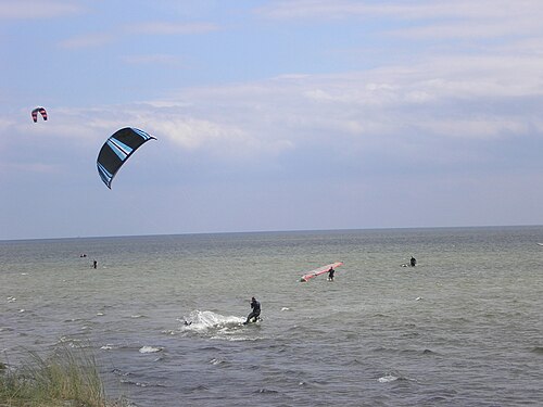 Faire du waterboard (kitesurf)