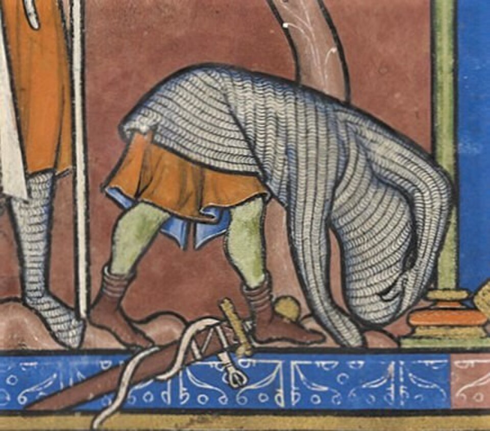 « David rejette l'armure inhabituelle » (détail du fol. 28r de la Bible de Morgan du XIIIe siècle). L'image montre une méthode pour retirer un haubert.