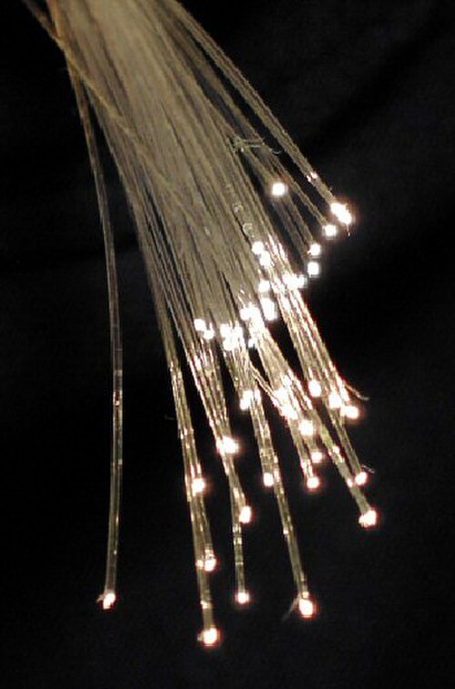 Faisceau de fils de verre avec lumière émise par les extrémités