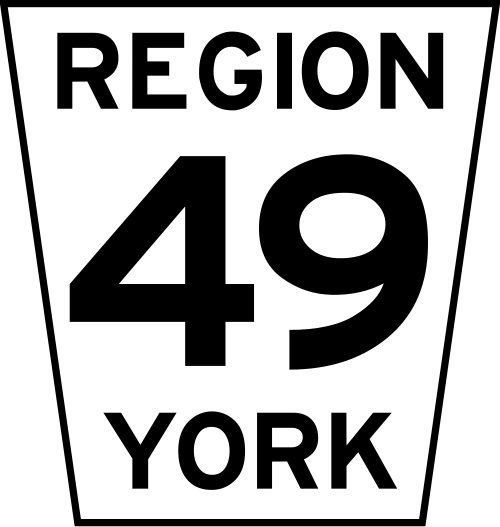 Panneau routier typique d'un comté ou d'une région de l'Ontario utilisant un trapèze isocèle inversé