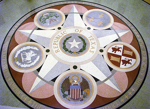 Mosaïque en terrazzo représentant les sceaux des six nations qui ont gouverné le Texas