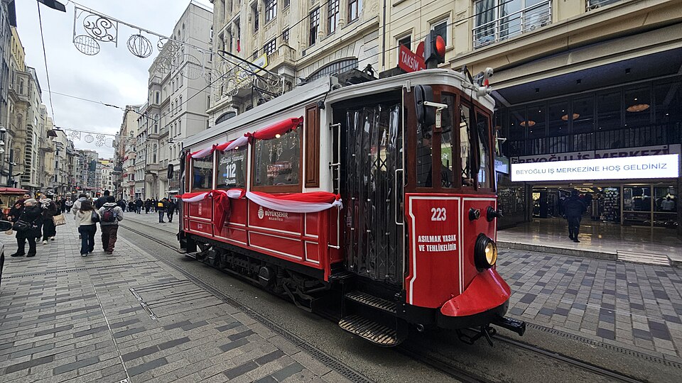 A nostalgic tram on İstiklal Avenue, decorated for the 112th anniversary of the city's electric powered tram service which began in 1914, replacing the horse-drawn tram service between 1872 and 1914