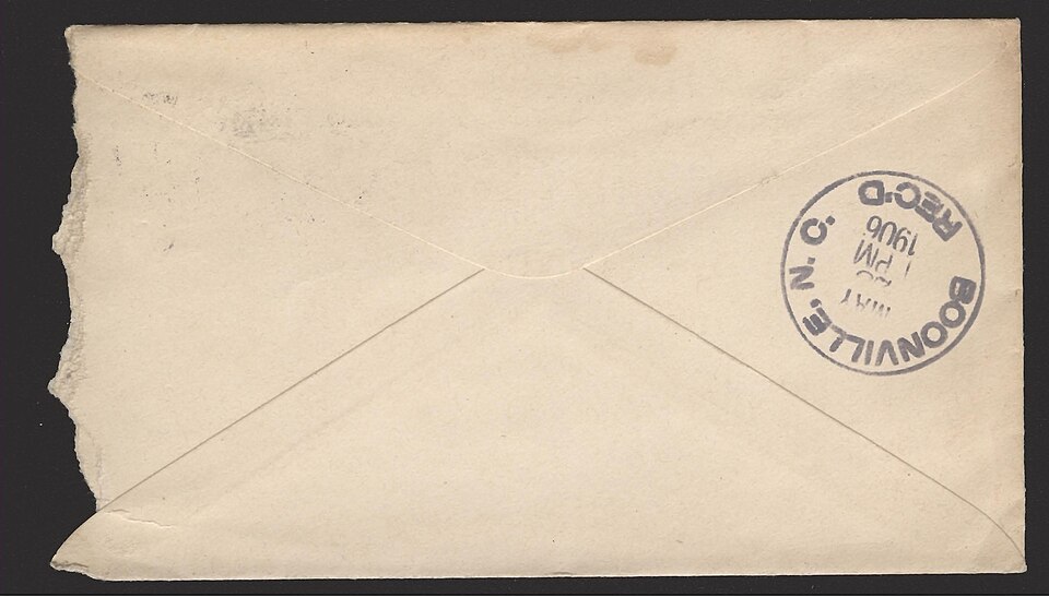 Au verso de l'enveloppe ci-dessus, montrant un cachet postal supplémentaire du bureau de réception