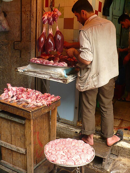 Un boucher au travail à Alep, en Syrie