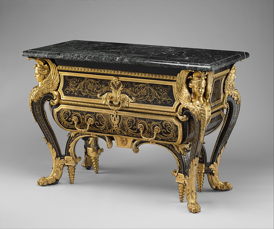 Commode; by André-Charles Boulle; c.1710–1732; walnut veneered with ebony and marquetry of engraved brass and tortoiseshell, gilt-bronze mounts, antique marble top; 87.6 x 128.3 x 62.9 cm; Metropolitan Museum of Art (New York City)