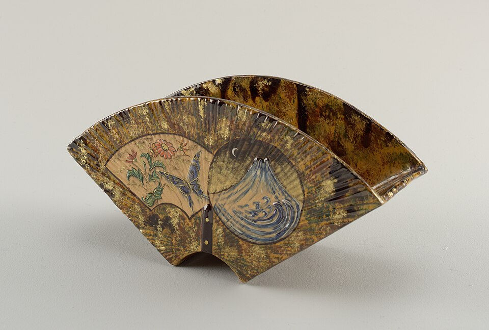 Faience or earthenware vase with two feet, with mountain night scene on the back and a floral daylight scene with butterfly on the front, by Gallé (1884–85), Cooper Hewitt, Smithsonian Design Museum, New York City