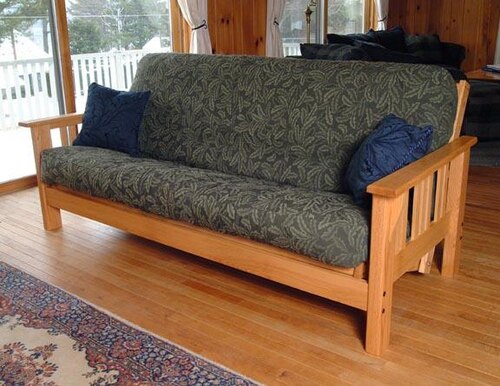 Futon de style occidental, plié en canapé sur un cadre de canapé-lit-futon
