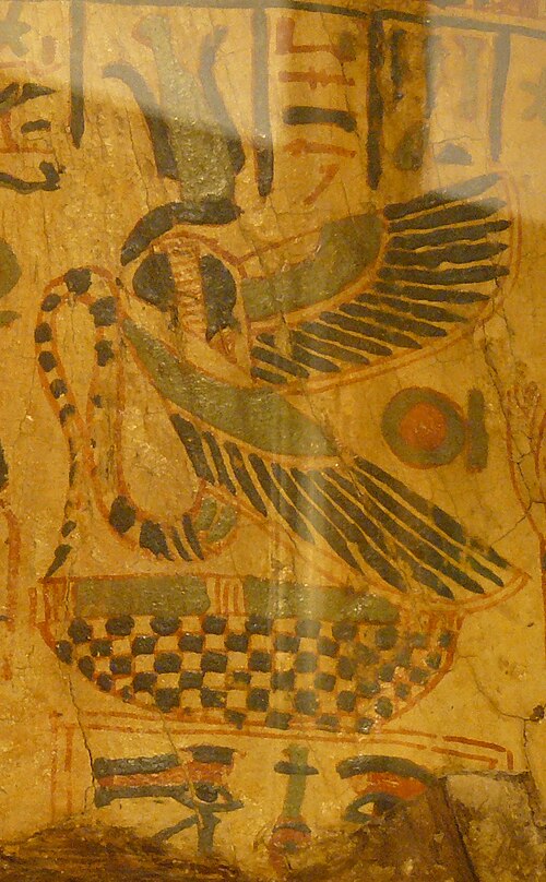 Wadjet peint sur un cercueil portant la couronne Atef