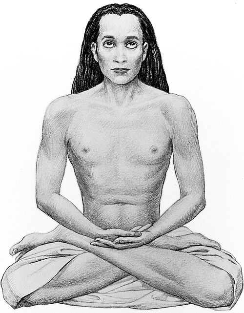 La position du lotus du yoga, démontrant la rotation externe de la cuisse au niveau de la hanche.