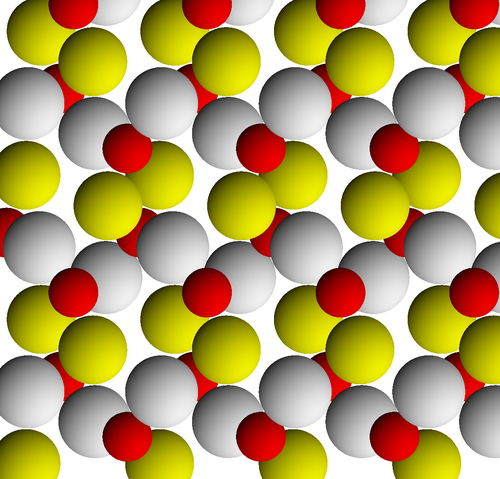 La structure cristalline de la goethite vue selon [001]. Les ions rouges sont du fer, les blancs sont de l'oxygène et les jaunes sont de l'hydroxyde.