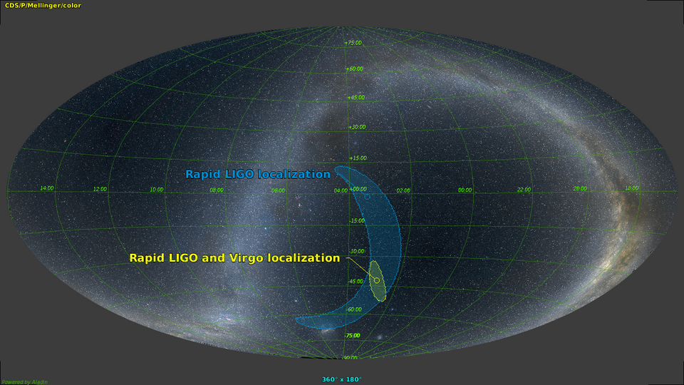 Carte du ciel entier utilisant la projection de Mollweide, montrant deux zones correspondant à la localisation d'un événement en utilisant uniquement les 2 détecteurs LIGO, et en utilisant à la fois LIGO et Virgo. La zone avec les 3 détecteurs est plus petite d'un facteur 20.