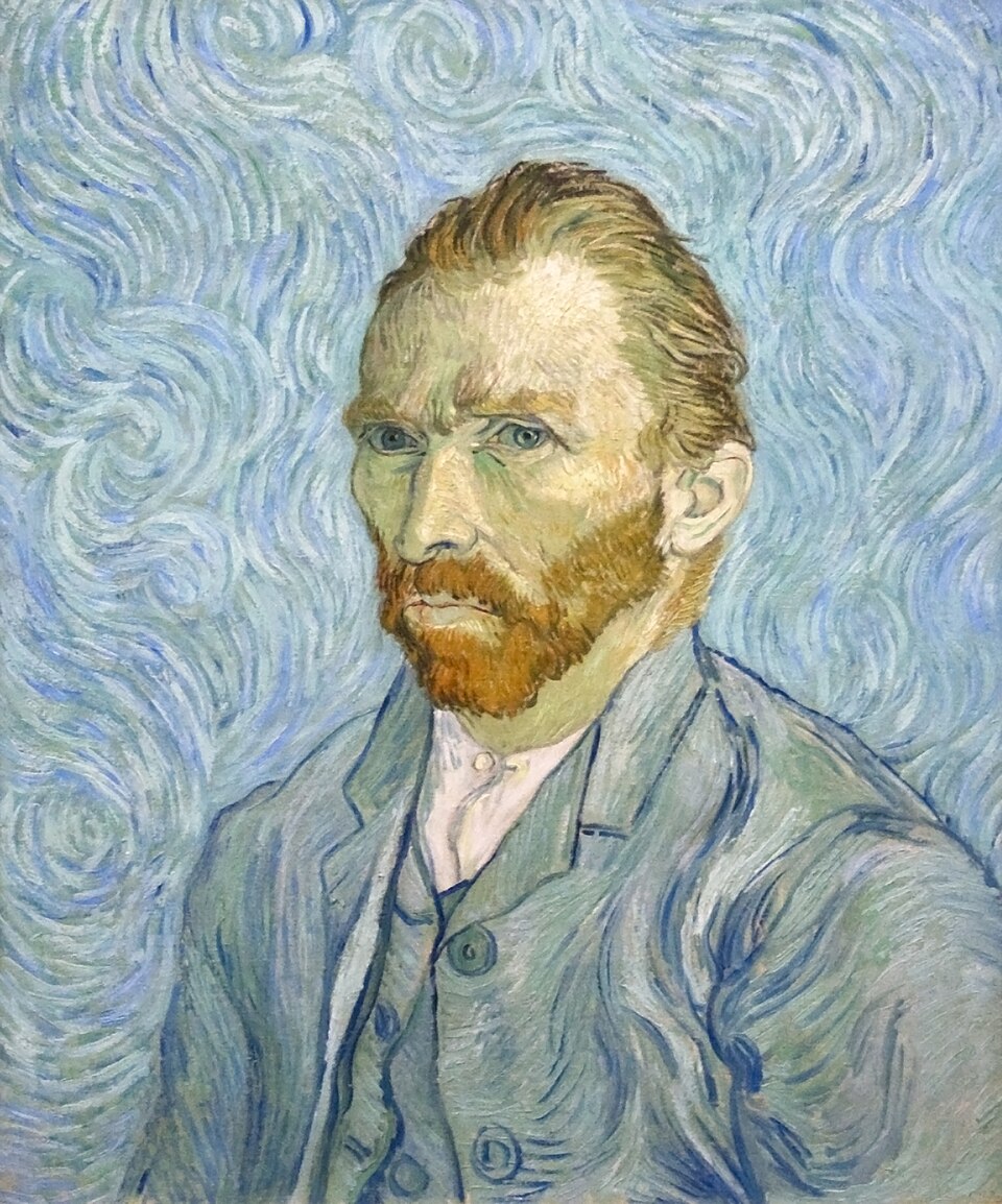Portrait de Vincent van Gogh, vu de gauche, avec un regard extrêmement intense et concentré, et une barbe rousse.